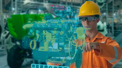 Industrial worker viewing a digital twin on a screen